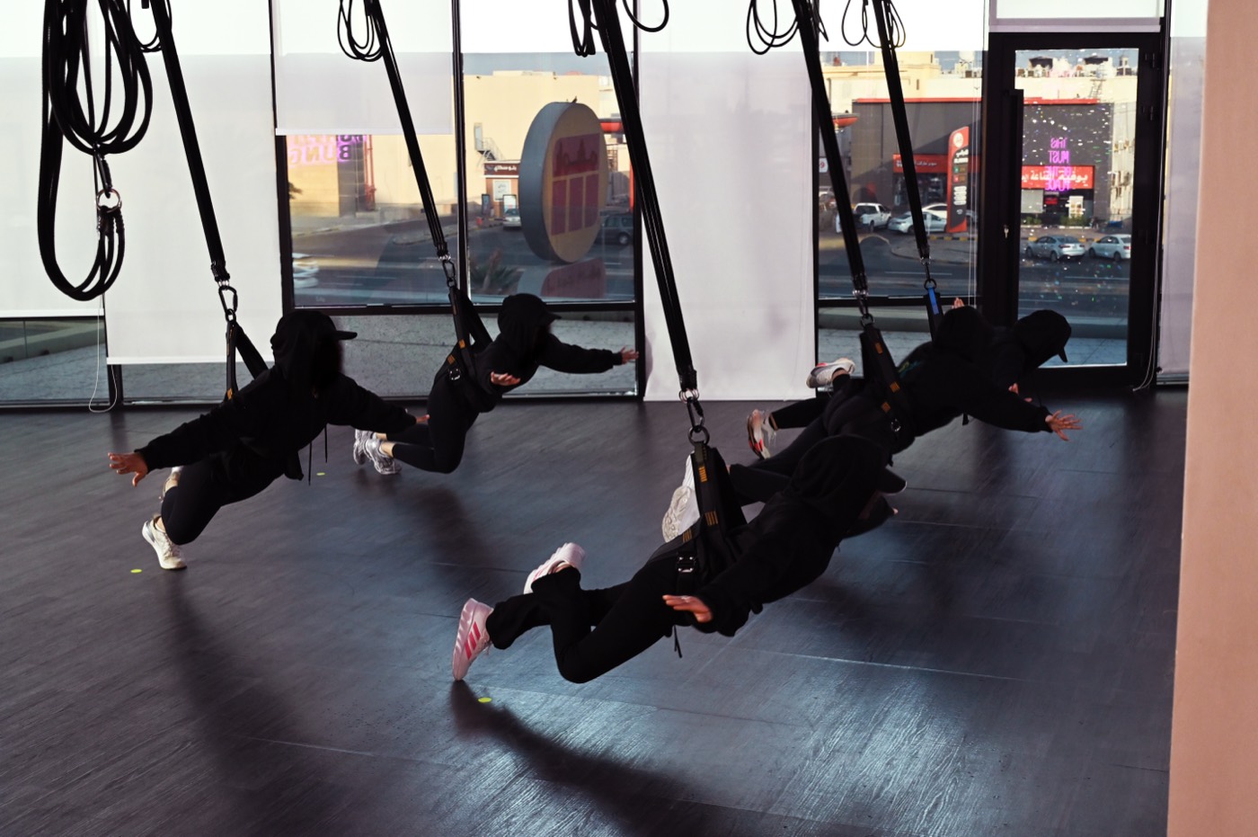 Hands-on practice with bungee fitness techniques and systems