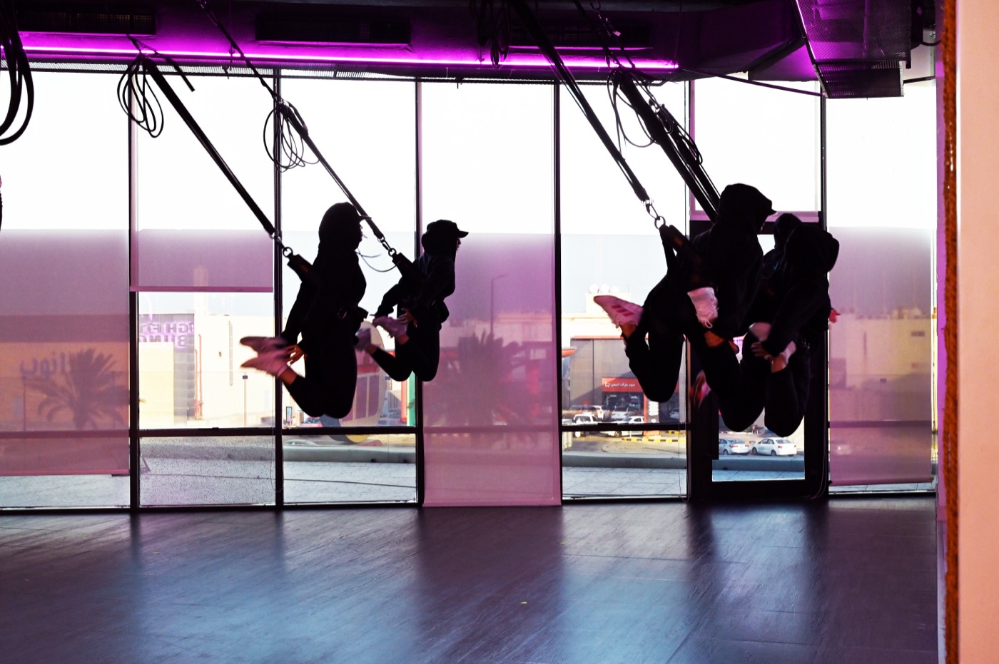 Bungee fitness trainees in full flight